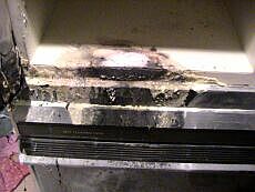 Notice the "Self Cleaning Oven" label. Oh the irony.